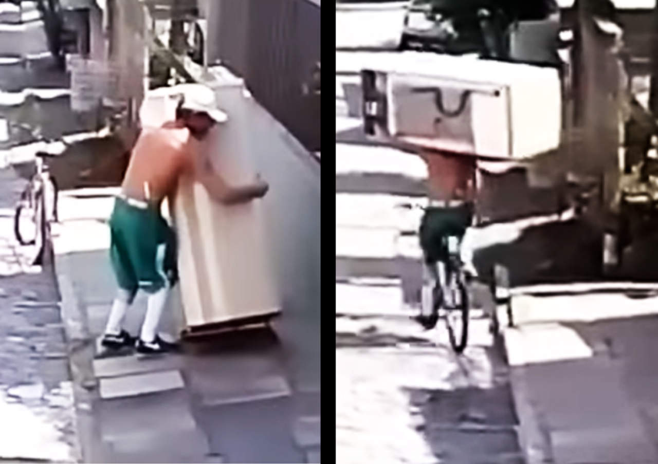 Admiran a ciclista capaz de cargar refrigerador a cuestas