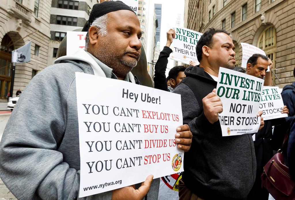 Van a huelga conductores de Uber en EUA; reclaman recorte a salarios