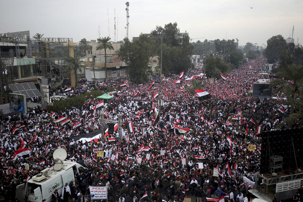 Miles exigen la salida de EUA de Irak con manifestación