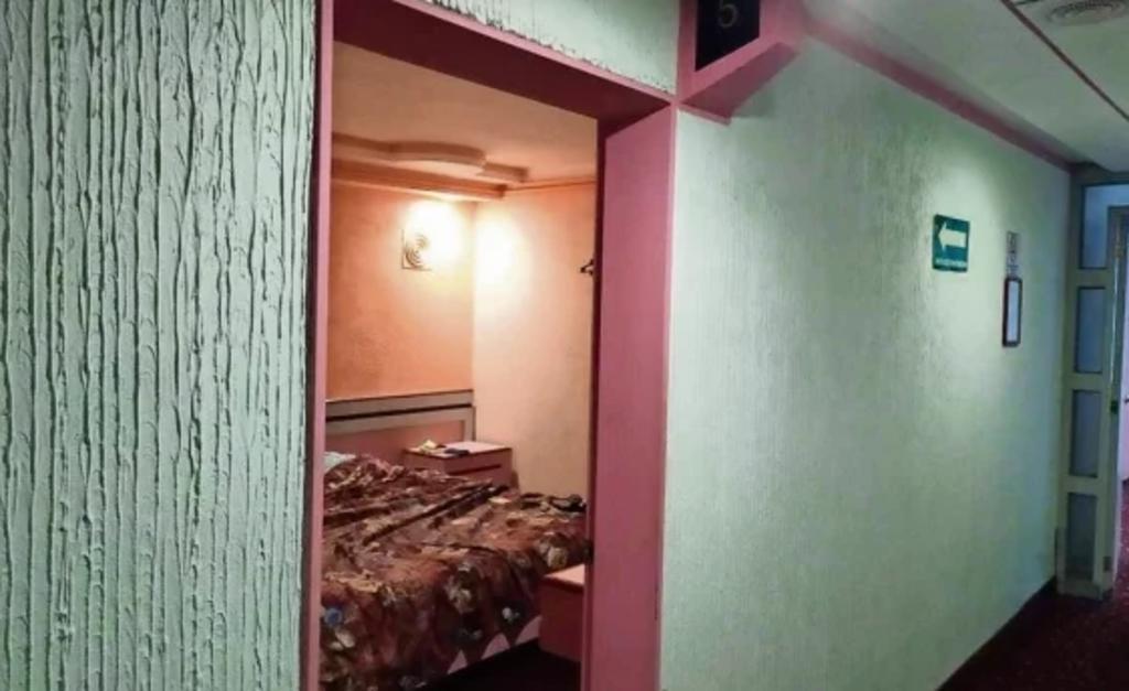 Asesinan a mujer en hotel de CDMX; tenía cuatro hijos
