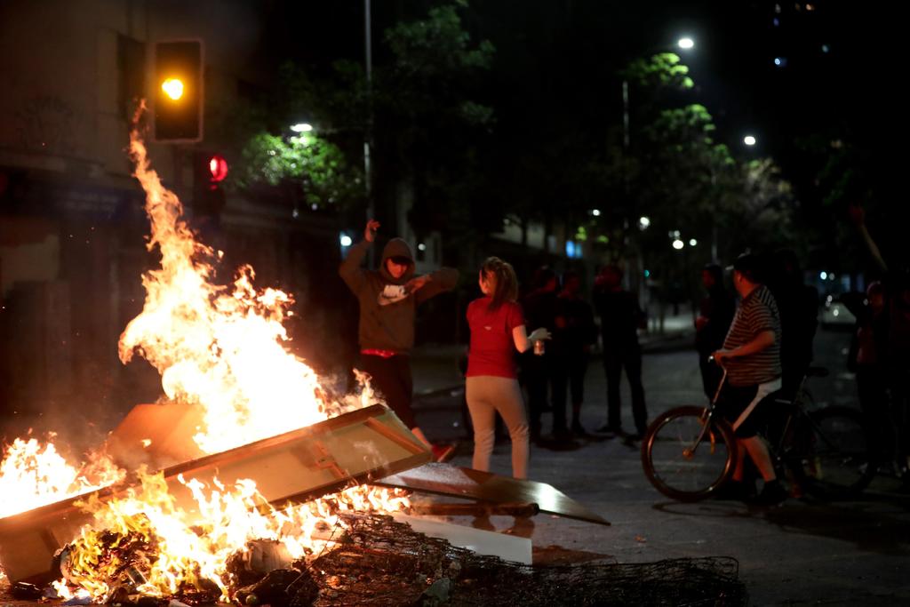 Protestas dejan un muerto y 124 detenidos en Chile