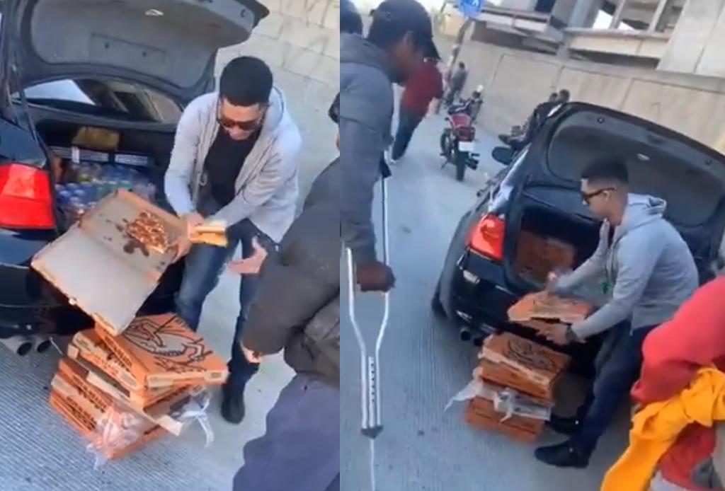 VIRAL: Aplauden en redes a joven que repartió pizza a indigentes en Tijuana