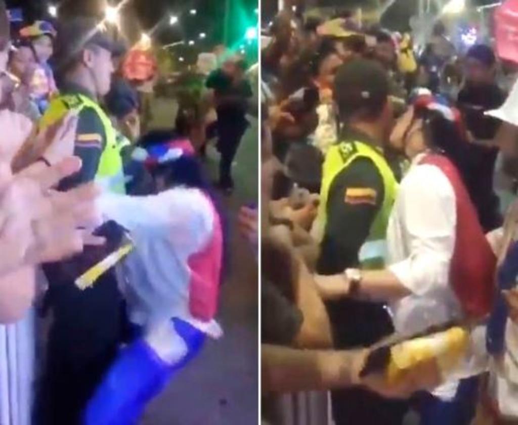 VIDEO: Mujer acosa a policía durante desfile de carnaval