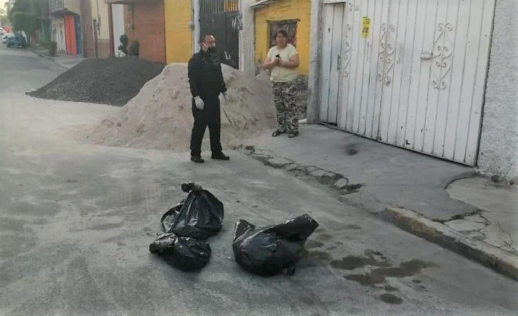 Hallan tres bolsas con restos humanos en Nezahualcóyotl