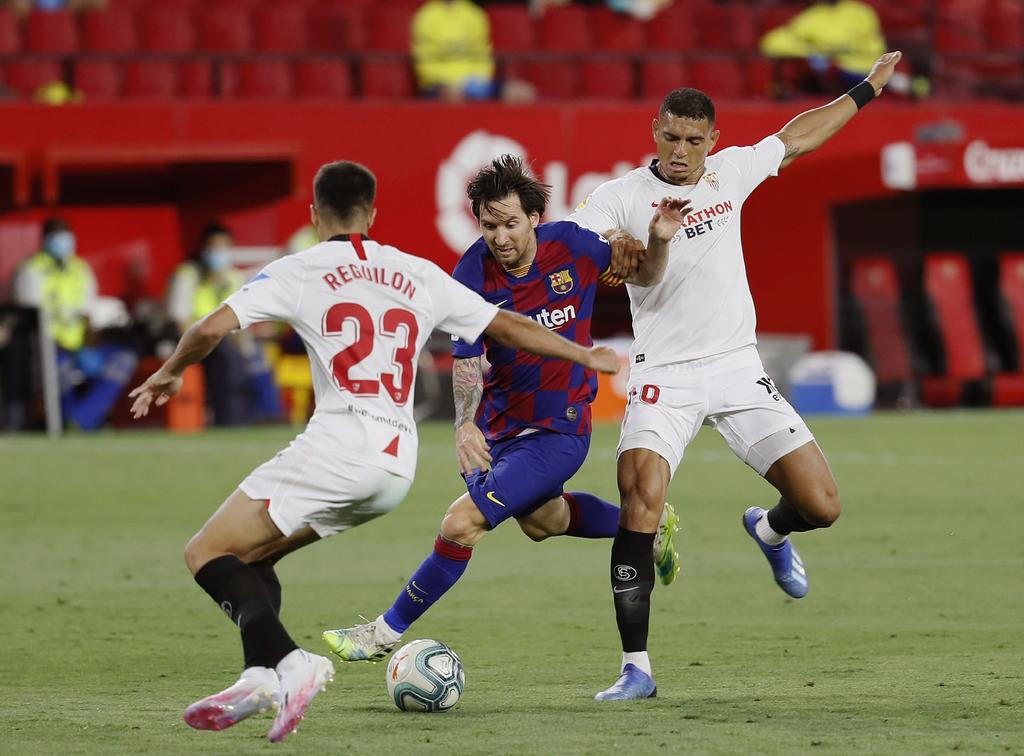 Barcelona empata con Sevilla y peligra su liderato en La Liga