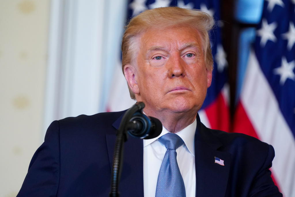 Llama Trump a boicotear Goodyear; alega prohibición de sus gorras de campaña