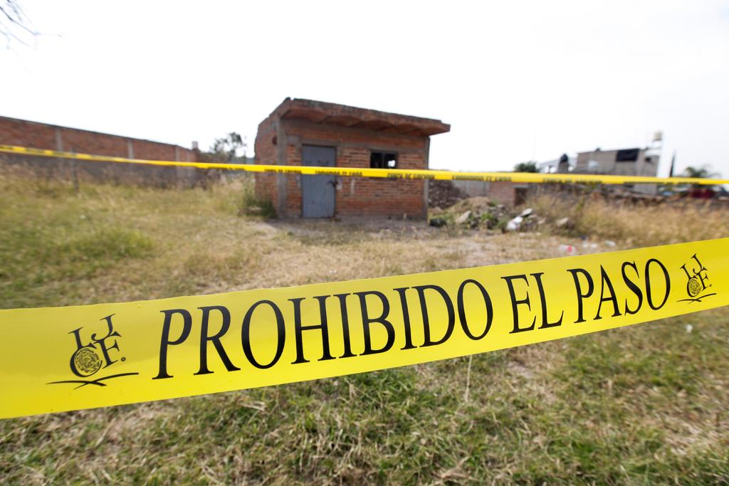 Recuperan 113 cuerpos de fosa clandestina en Jalisco