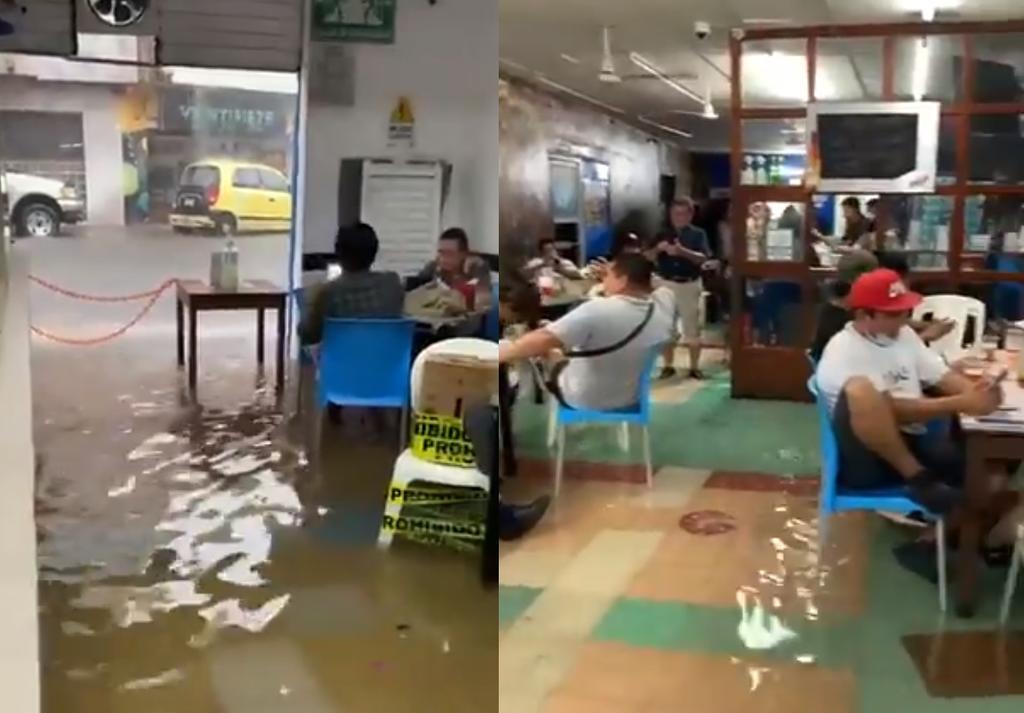 VIRAL: Pese a inundación, clientes disfrutan en el interior de un bar en Tabasco