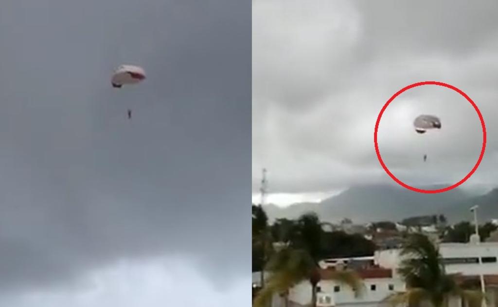 Mujer termina suspendida en el aire tras romperse su paracaídas en Puerto Vallarta