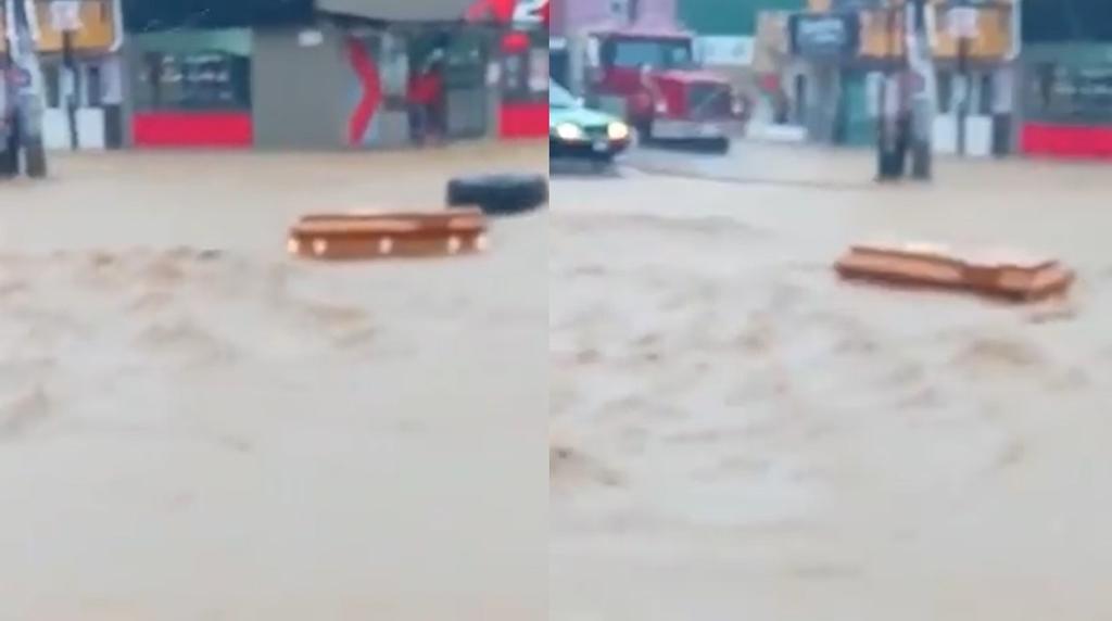 Captan un ataúd flotando en las inundaciones de Xalapa provocadas por huracán 'Grace'