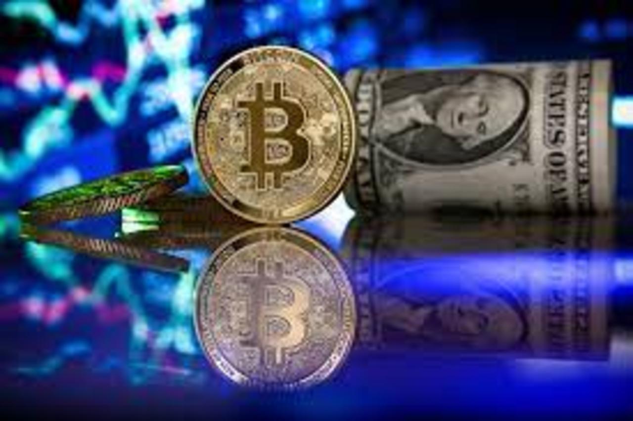 El bitcoin alcanza precio récord de más de 66 mil dólares