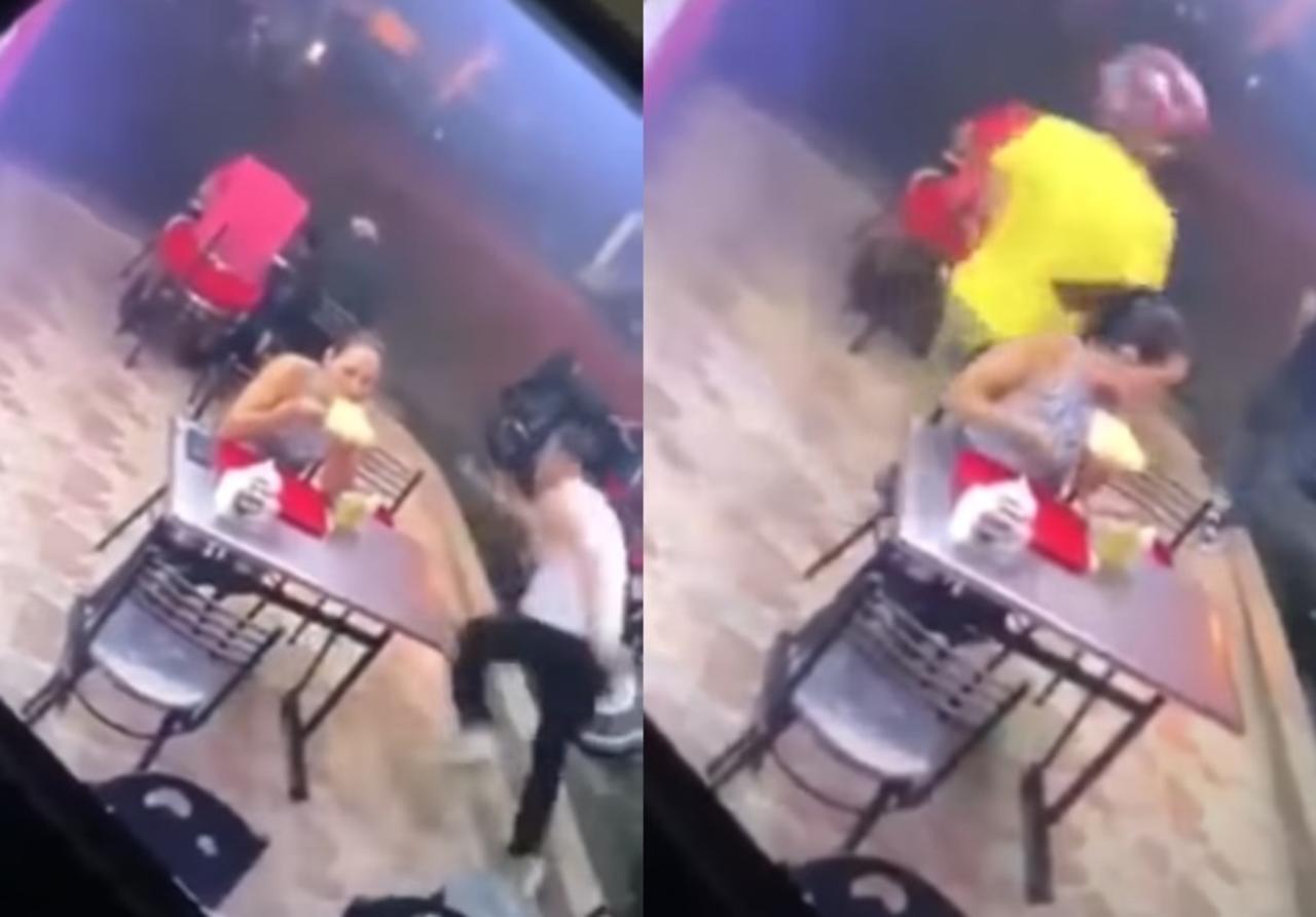 Mujer es abandonada por su novio durante asalto en restaurante y ella continúa comiendo pizza